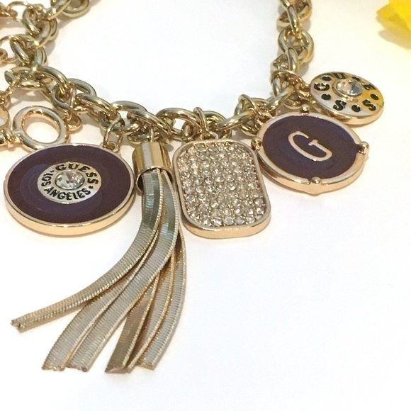 𝅺3/$29! GUESS Charm Bracelet Heart, Key, Tassel - Picture 7 of 9